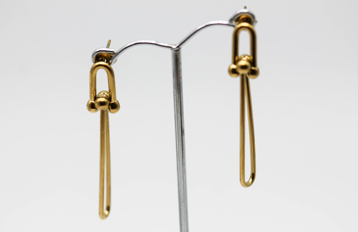 ARETES ESLABONES ESCALONADOS TFY 45MM; TONO DORADO
