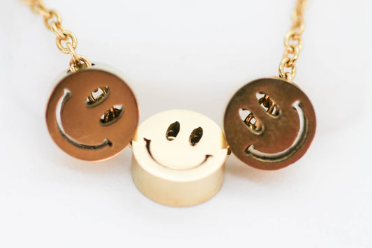 COLLAR 3 HAPPY FACE, TONO DORADO