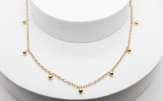 COLLAR 8 ESFERAS COLGANDO (4MM) 40CM + EXTENSION DE 5CM; TONO DORADO