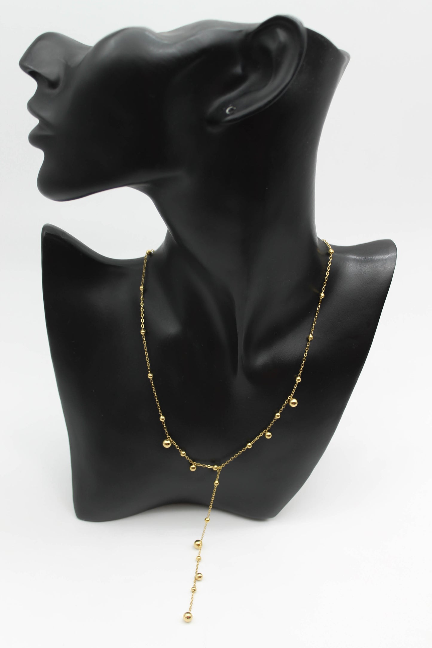 COLLAR CORBATIN ESFERAS CHICAS Y MEDIANAS; TONO DORADO