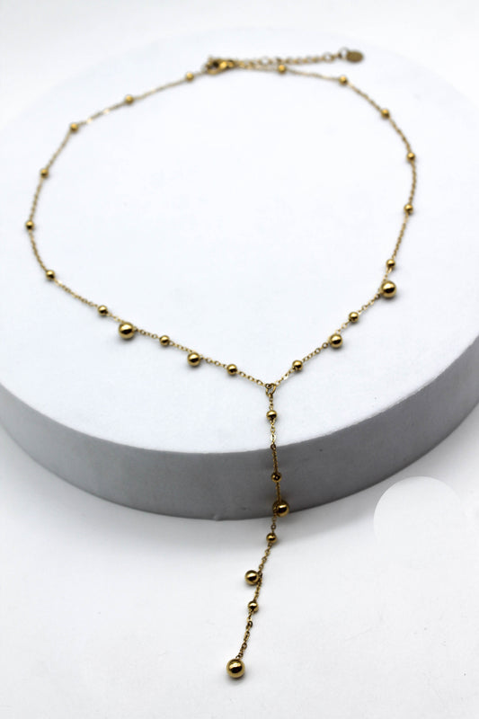 COLLAR CORBATIN ESFERAS CHICAS Y MEDIANAS; TONO DORADO