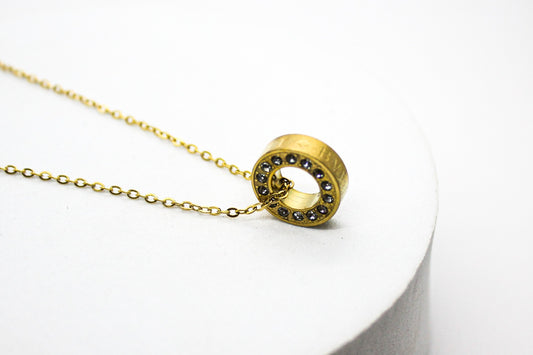 COLLAR ARO (MEDIDAS) BVLGARI, CIRCONIAS LATERALES; TONO DORADO