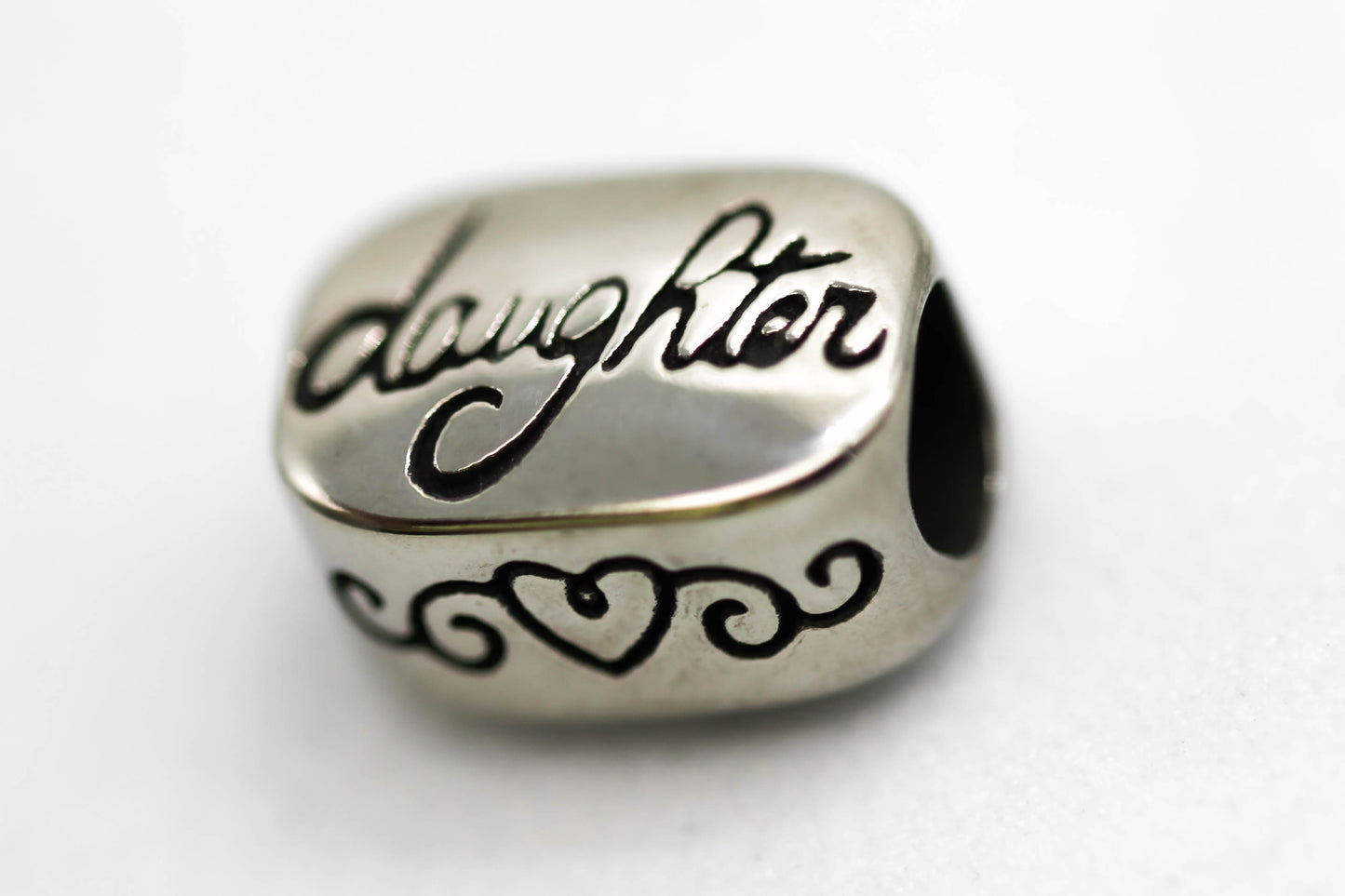 CHARM FLOR DAUGHTER; TONO PLATEADO