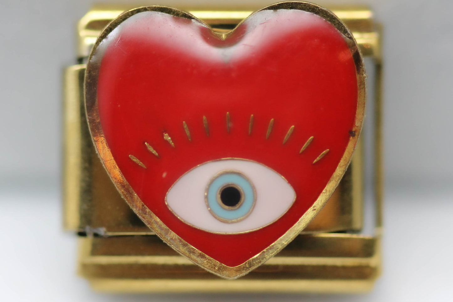 CHARM CORAZON CON ROJO CON OJO PULSERA ITALIANA