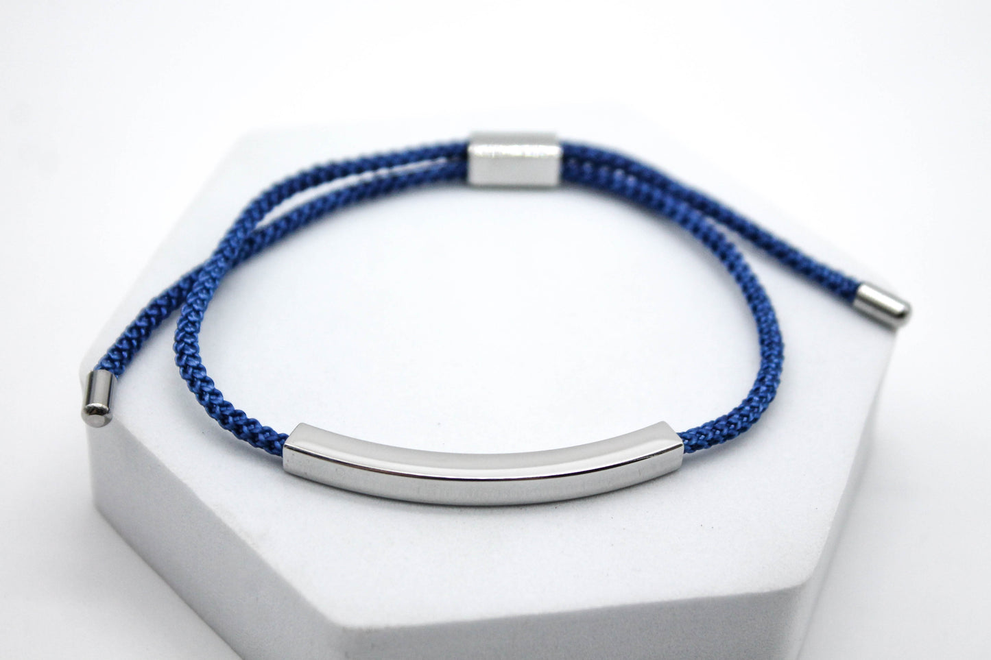 PULSERA UNISEX AJUSTABLE CORDON AZUL; TONO PLATEADO