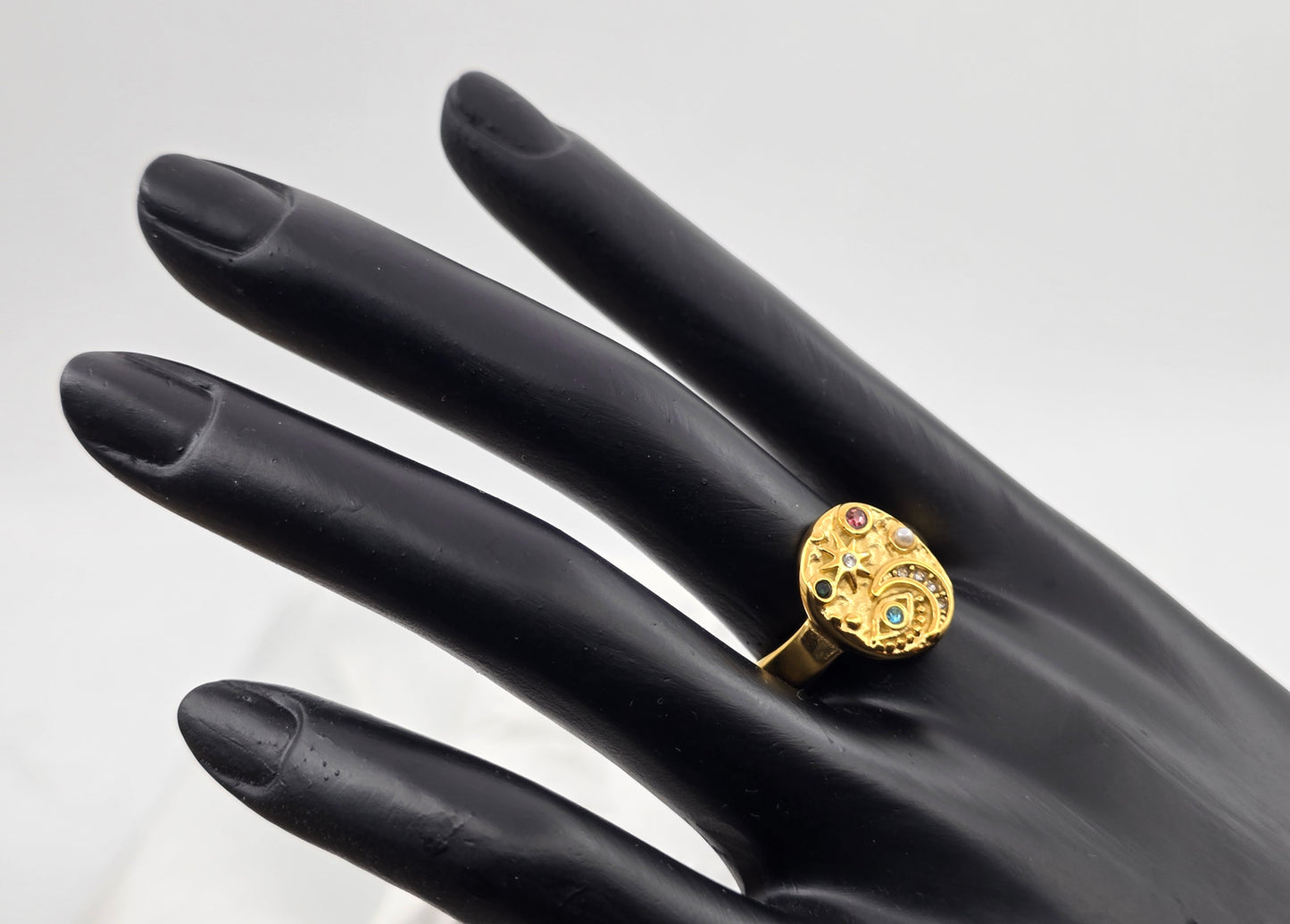 *ANILLO LUNA, OJO, ESTRELLA, PERLA; TONO DORADO*