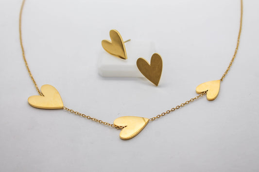 SET CORAZONES ALARGADOS; TONO DORADO