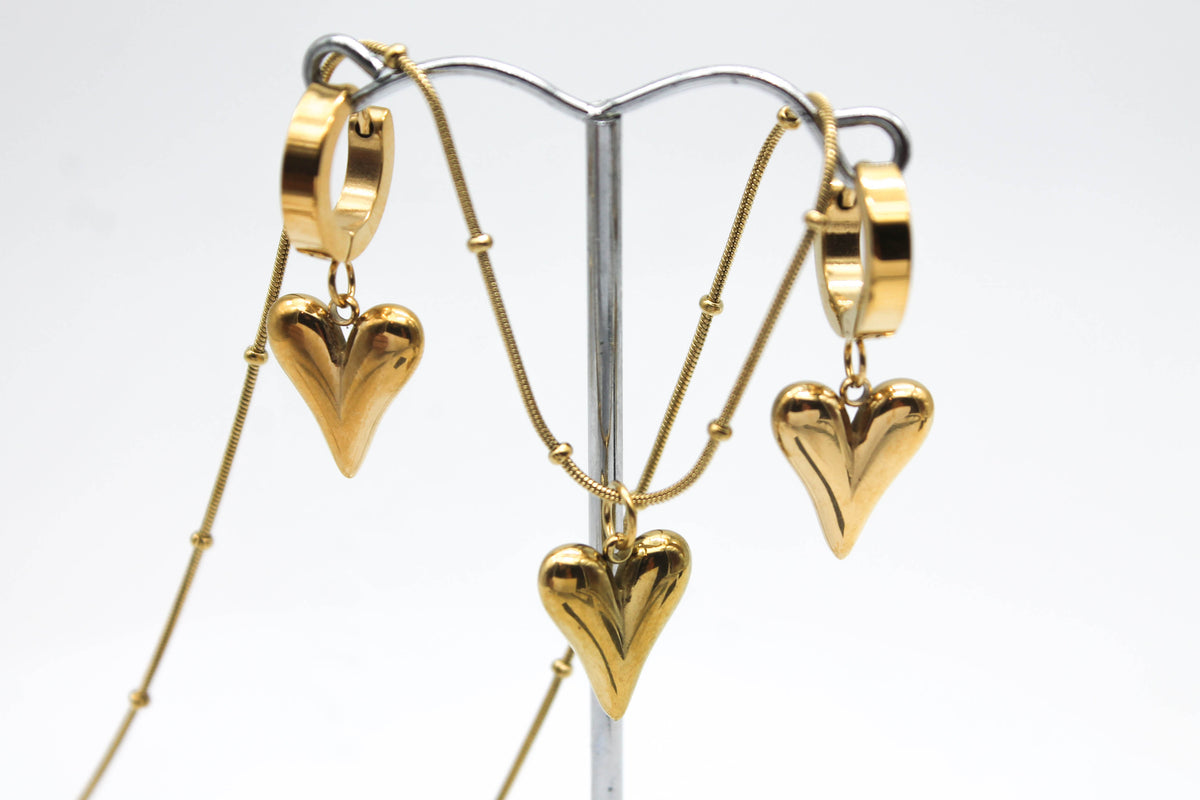 SET CORAZONES 3D HUGGIES CADENA ESFERITAS; TONO DORADO