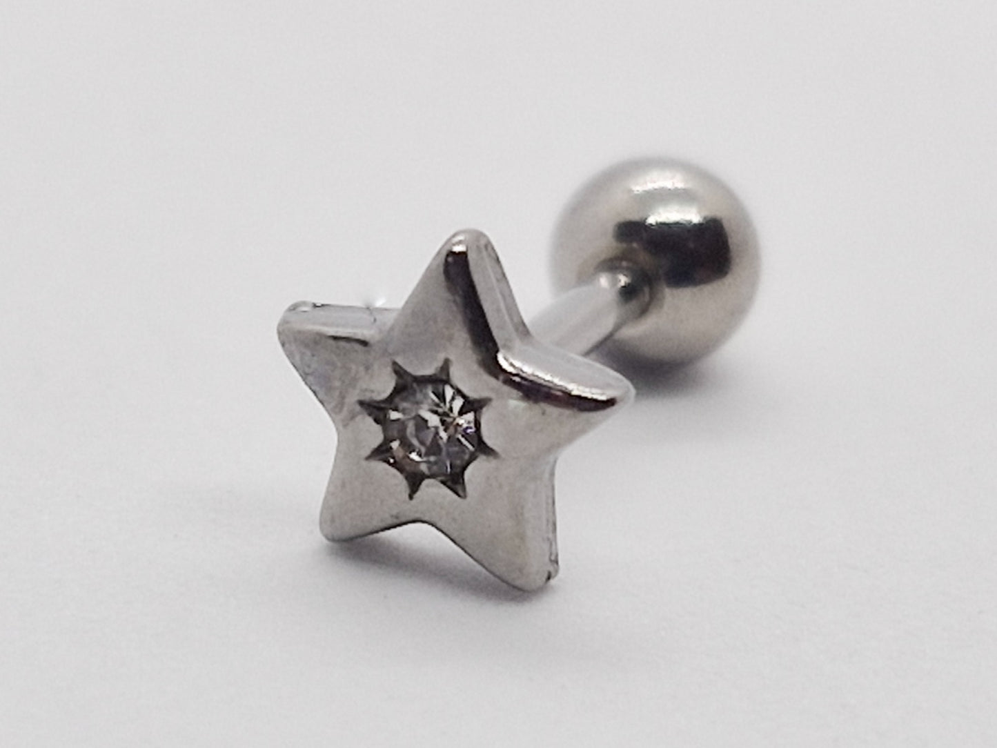 PIERCING ESTRELLA CON MINI CIRCONIA AL CENTRO; TONO PLATEADO