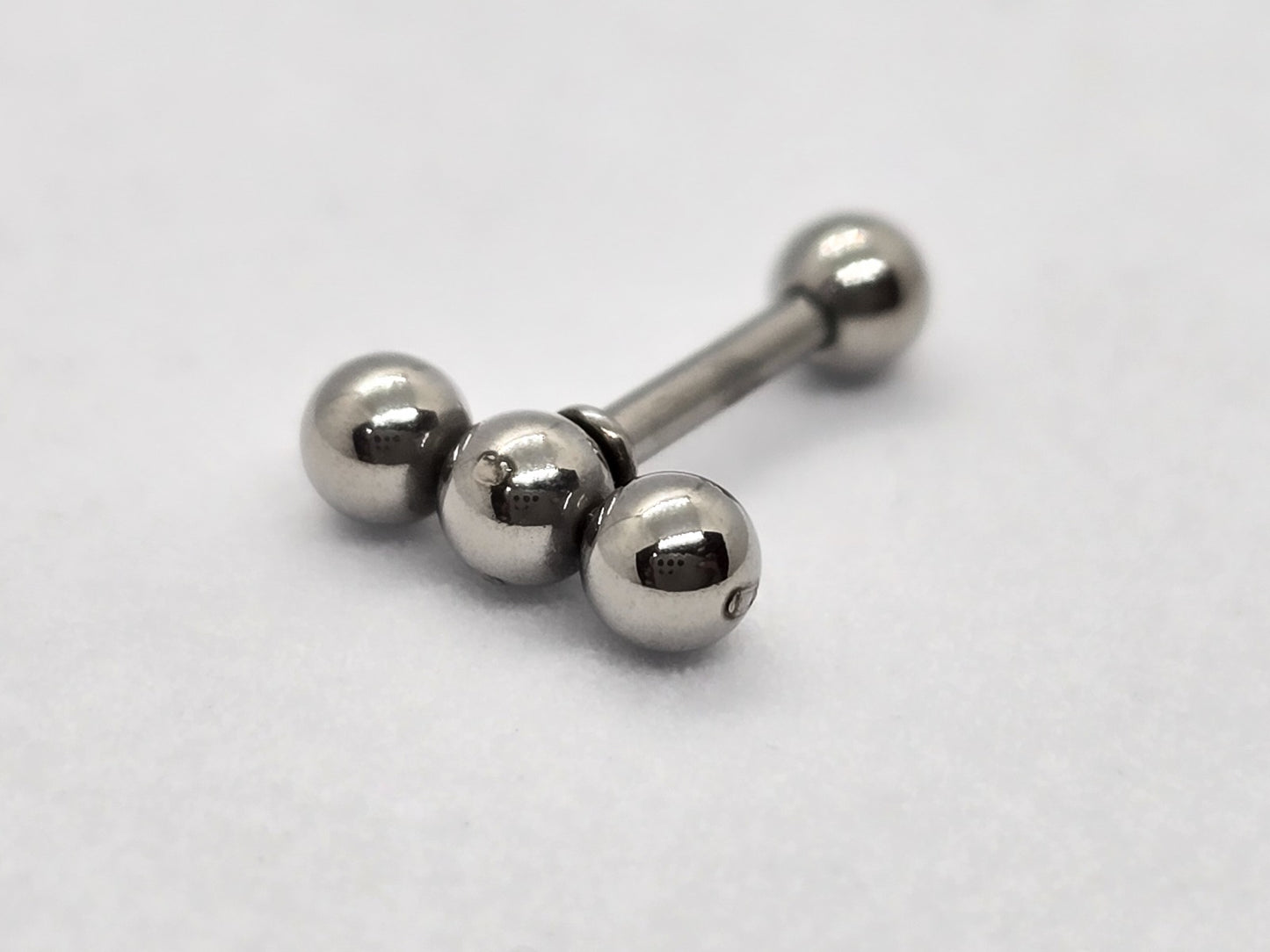 PIERCING TRES ESFERITAS EN LINEA; TONO PLATEADO