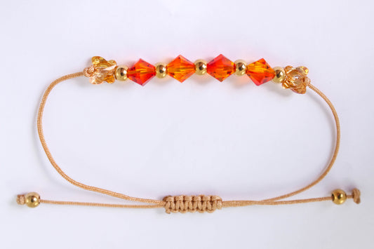 PULSERA TEJIDA 4 CRISTALES NARANJA Y 2 MARIPOSAS