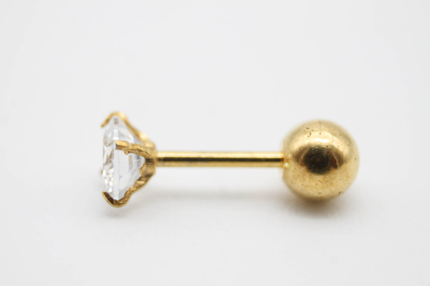 PIERCING CIRCONIA TRANSPARENTE 4 MM, TONO DORADO