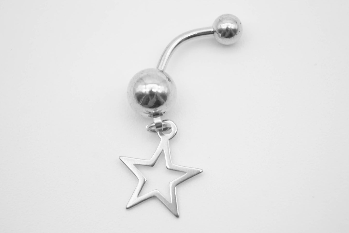 PIERCING PARA OMBLIGO ESTRELLA, TONO PLATEADO