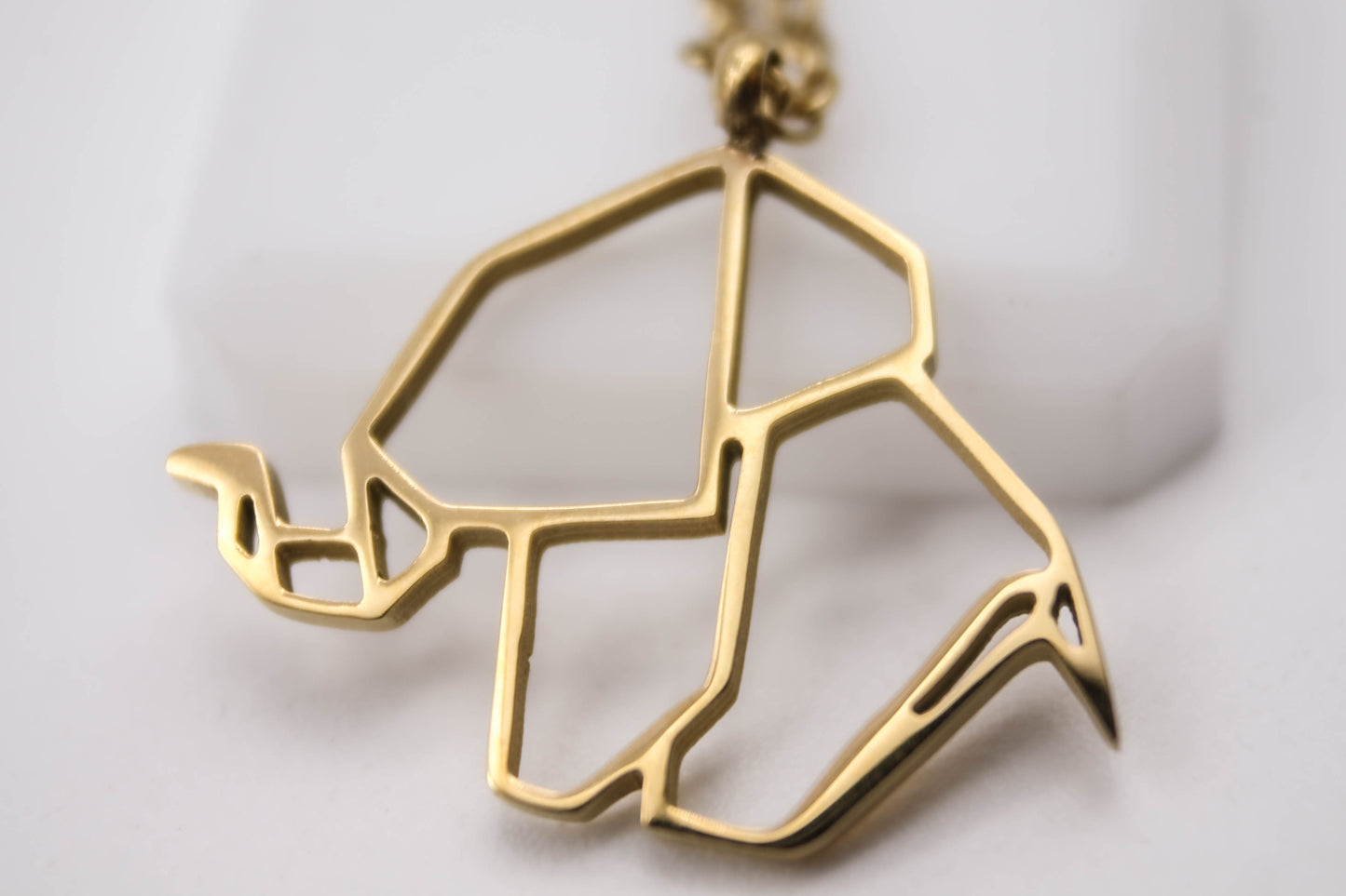 COLLAR ORIGAMI ELEFANTE, TONO DORADO