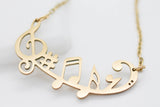 COLLAR CONJUNTO DE NOTAS MUSICALES, TONO DORADO