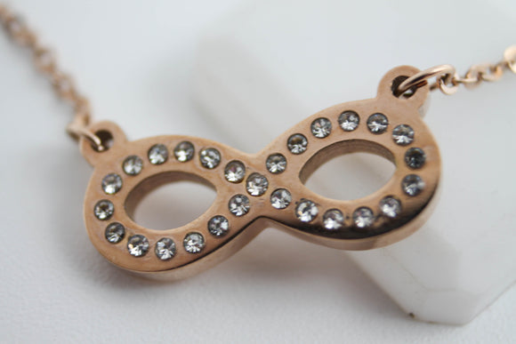 COLLAR DE INFINITO CON CIRCONIAS, TONO ROSA