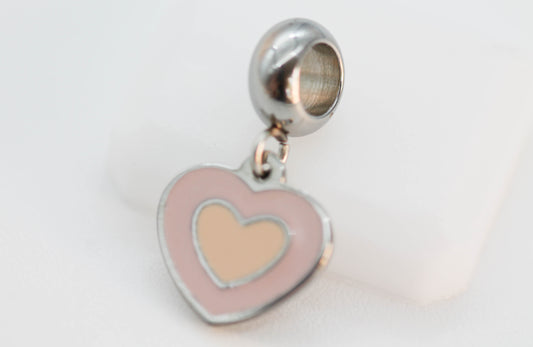 CHARM CORAZON ROSA CENTRO NUDE COLGANTE