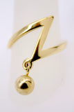 ANILLO "Z" Y ESFERA, TONO DORADO